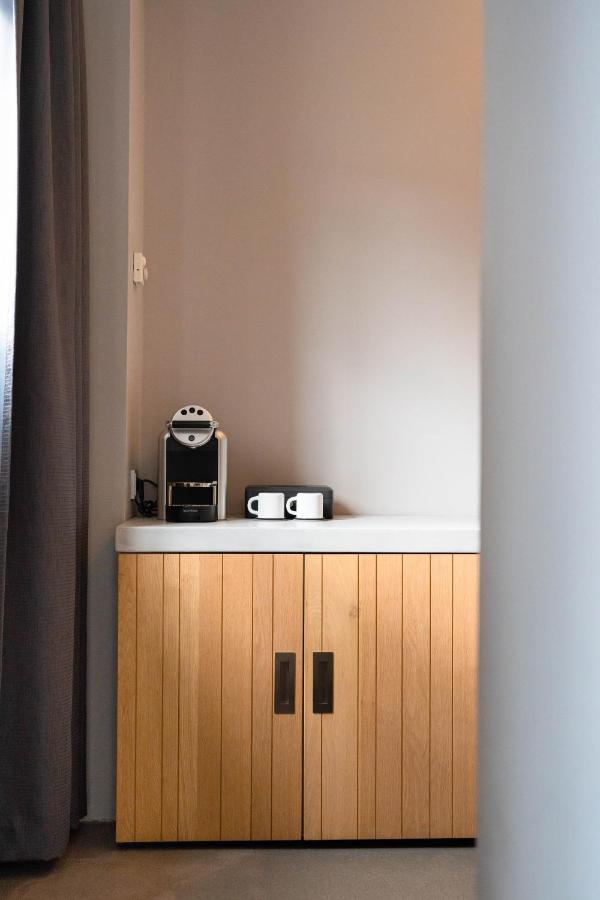 Het Arresthuis Рурмонд Экстерьер фото A Nespresso coffee machine in a hotel room