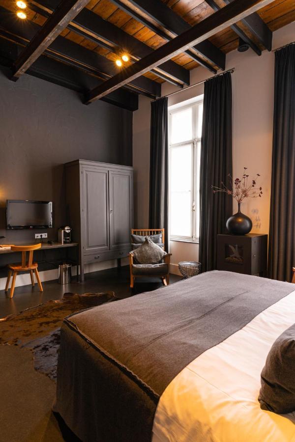 Het Arresthuis Рурмонд Экстерьер фото A bedroom